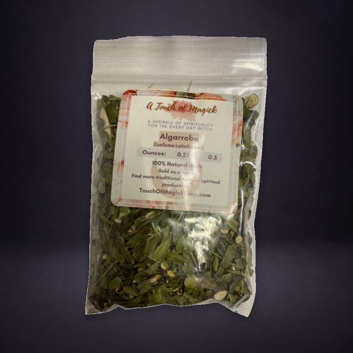 Algarrobo dried herb pouch on a matte charcoal and subtle royal-purple background.