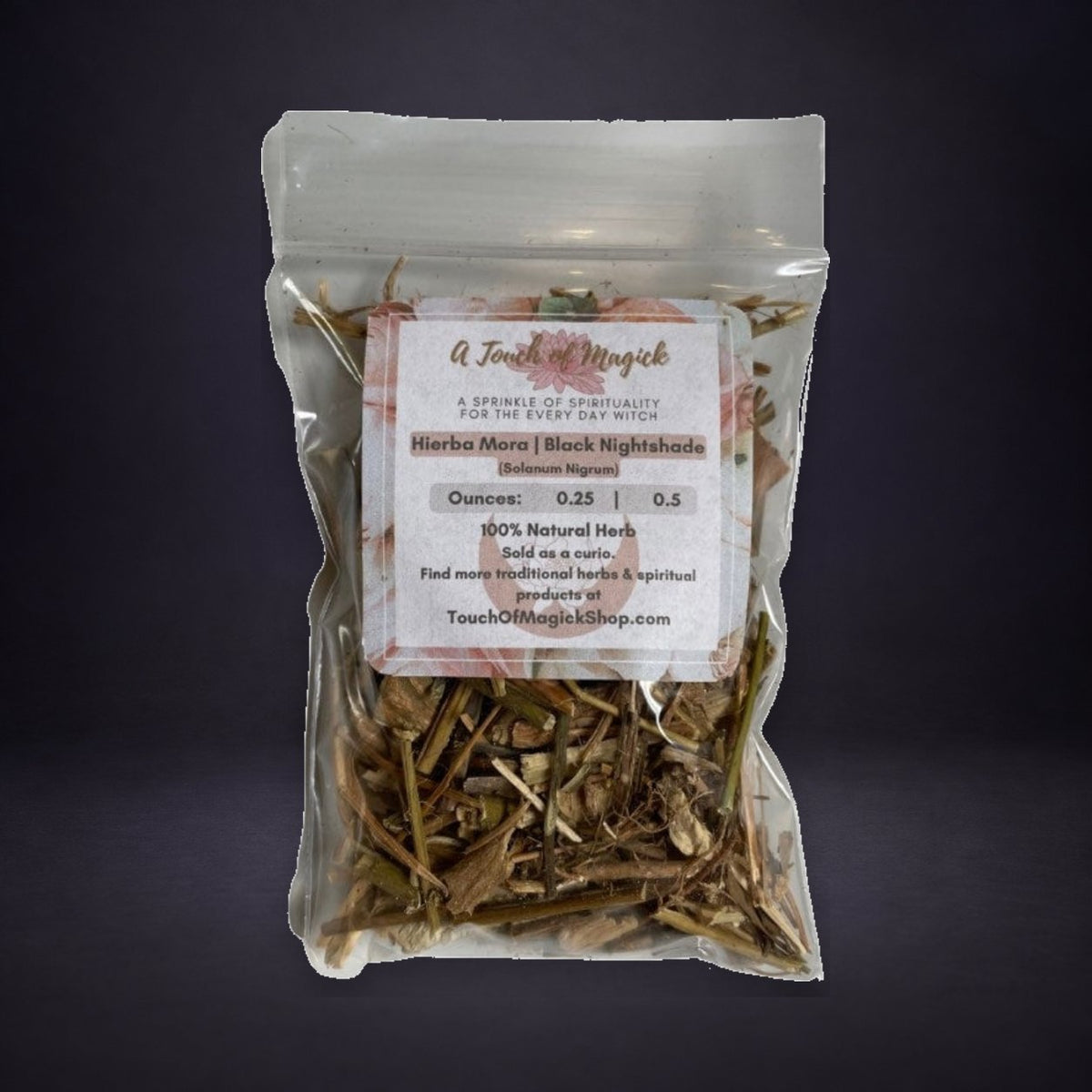 Hierba Mora Black Nightshade dried herb pouch on a matte charcoal and deep purple background