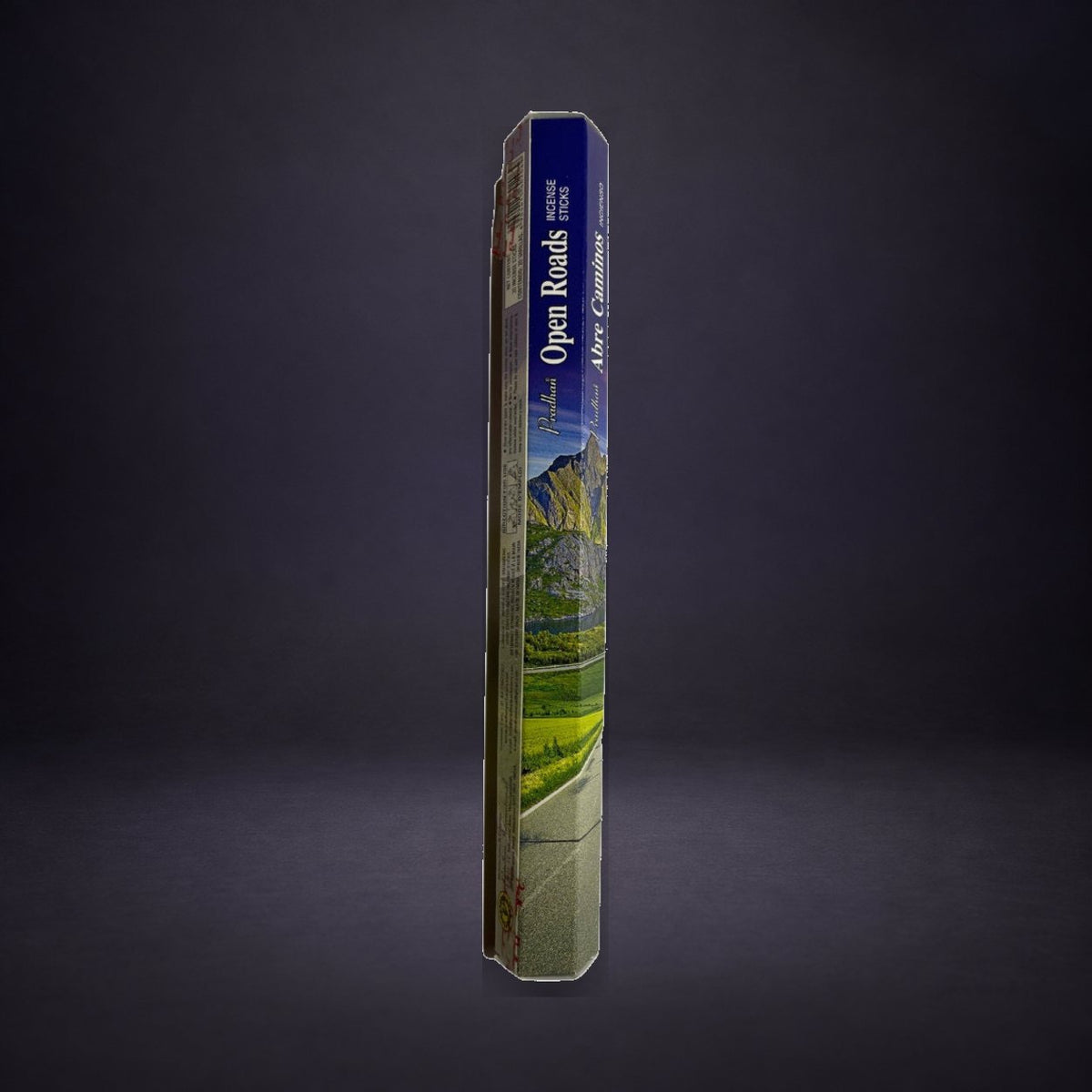 Open Roads incense box on a matte charcoal and subtle royal-purple background.