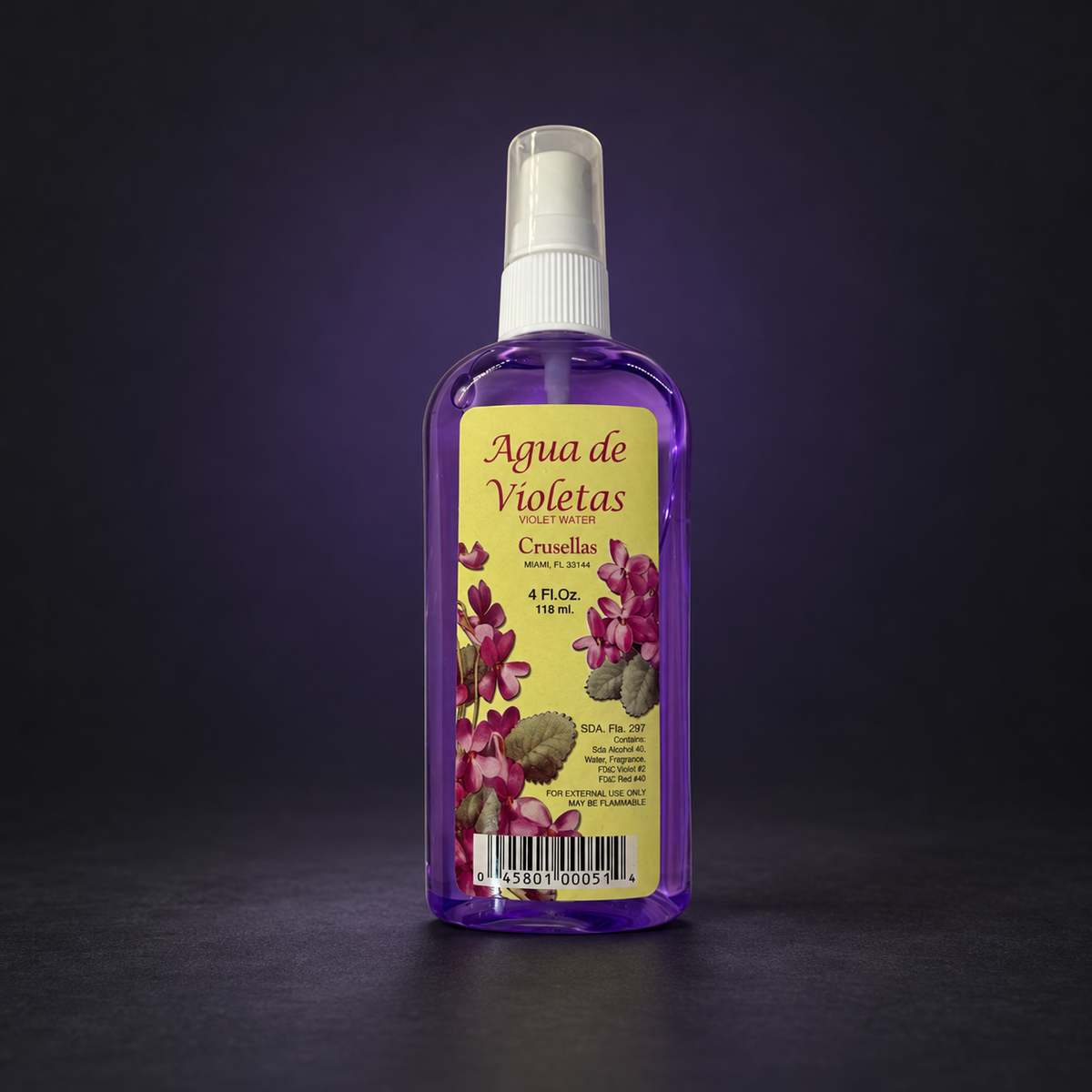 Agua de Violetas spray bottle on matte charcoal and deep royal-purple background.